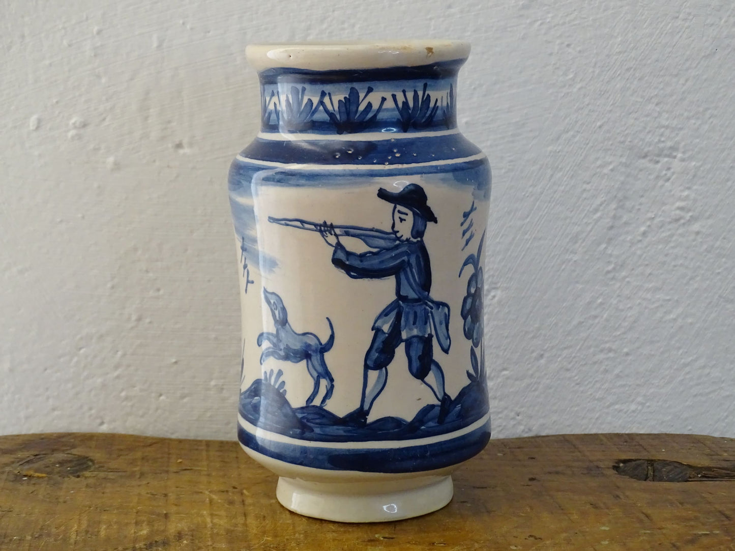 a vintage Spanish Catalan Albarello Pottery Pharmacy jar it is tin-glazed and hand-painted in blue and white