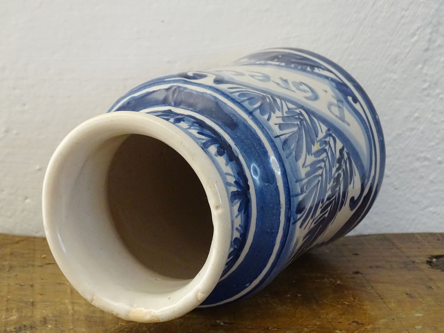 a vintage Spanish Catalan Albarello Pottery Pharmacy jar it is tin-glazed and hand-painted in blue and white