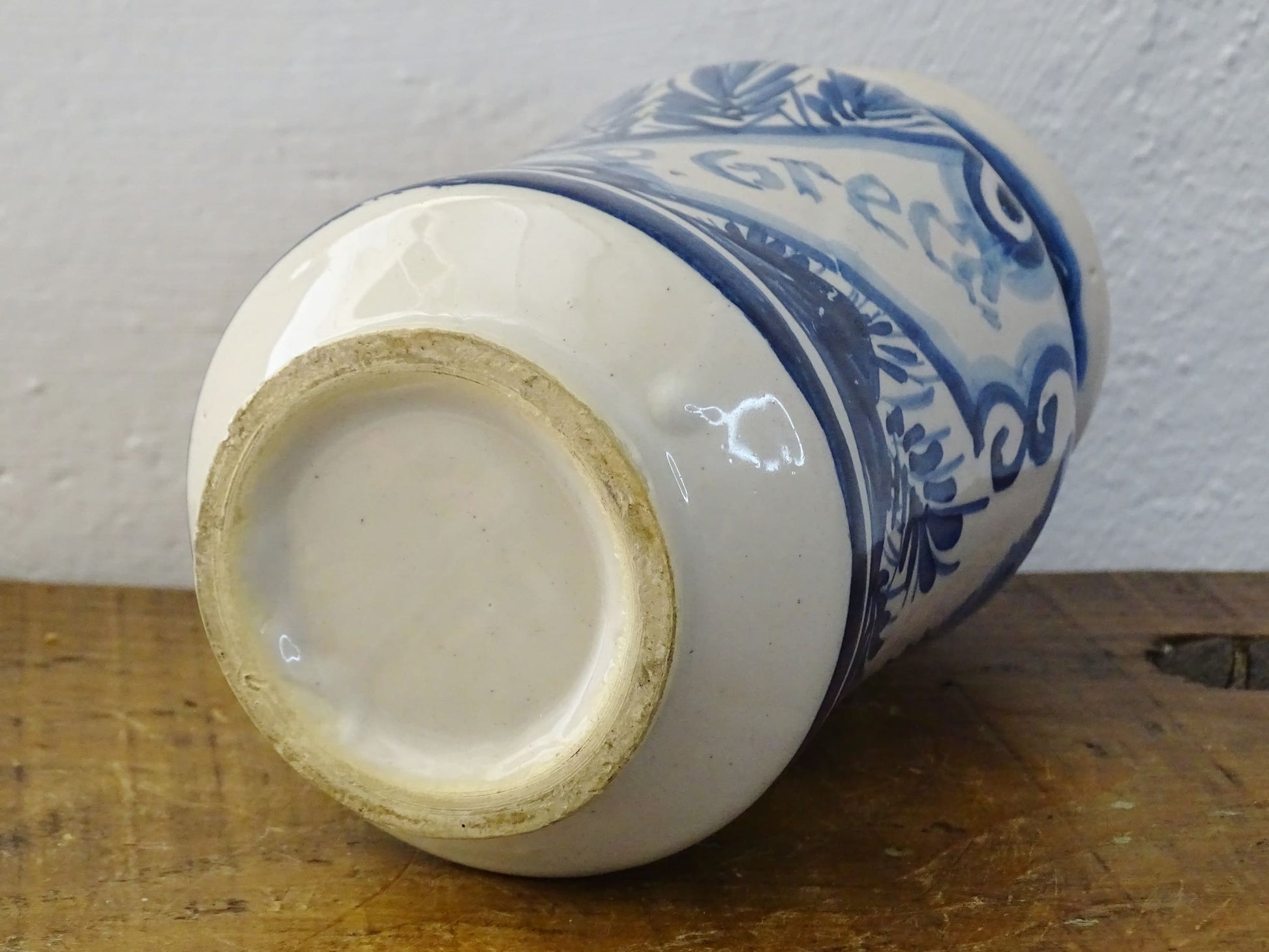 a vintage Spanish Catalan Albarello Pottery Pharmacy jar it is tin-glazed and hand-painted in blue and white