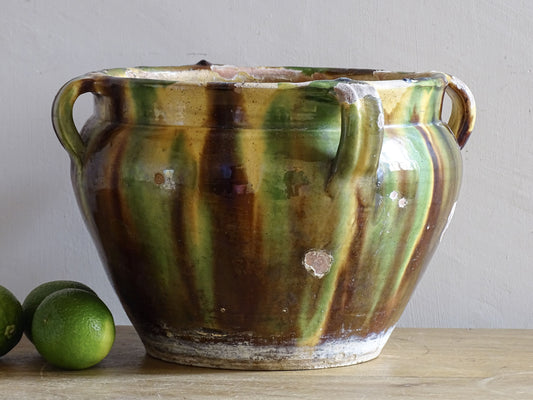 French antique ceramic planter from Castelnaudary. Pottery cache pot with a green, brown and yellow glaze