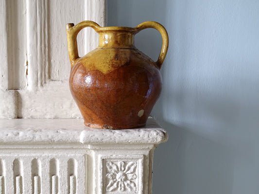 French antique pottery cruche or orjol with red and yellow glaze