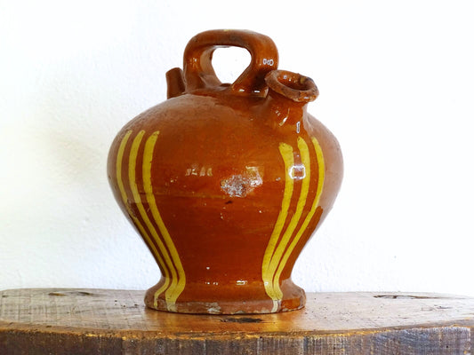 French antique pottery jug with red glaze and yellow stripe