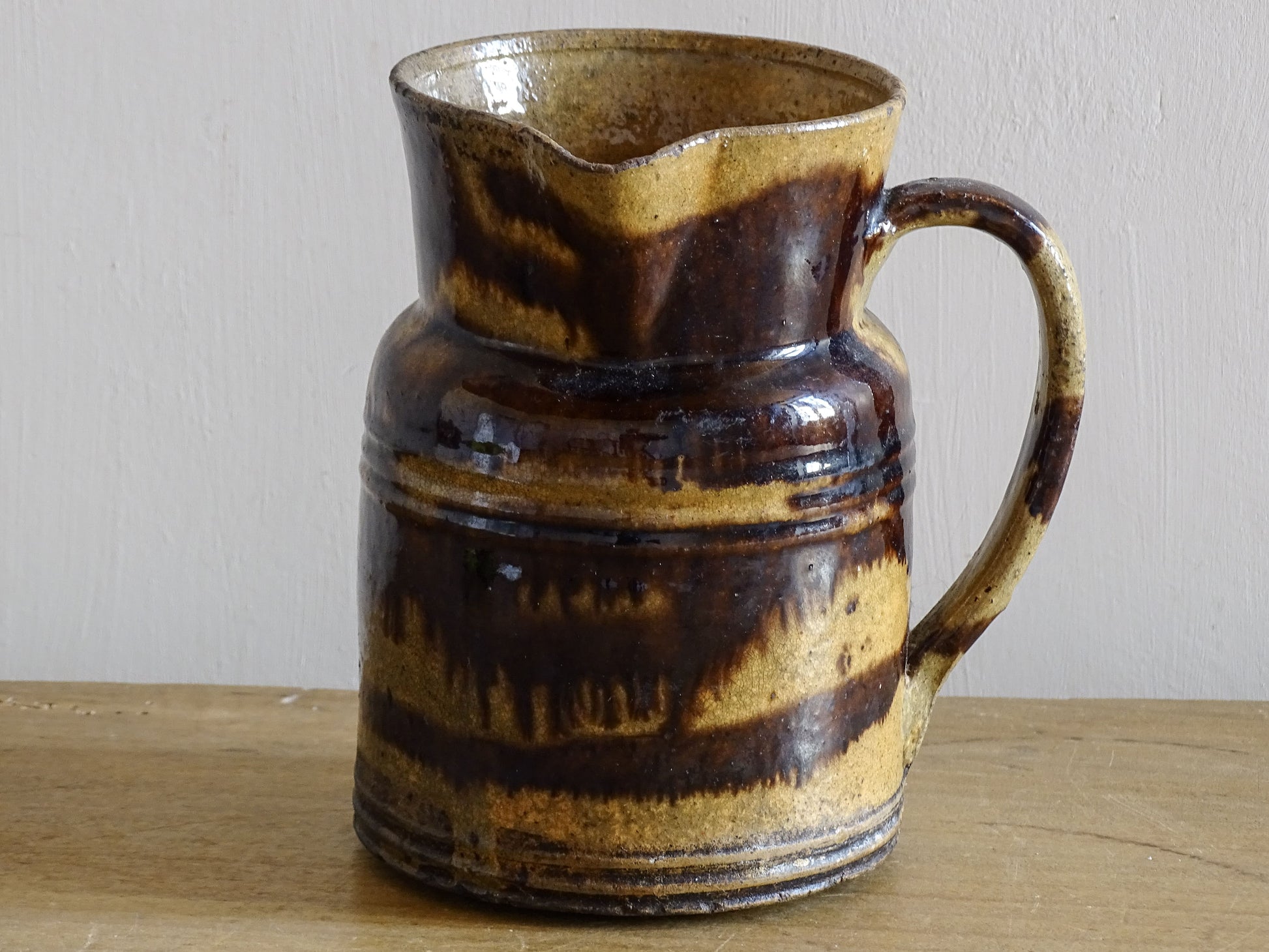 French antique ceramic jug with brown glaze