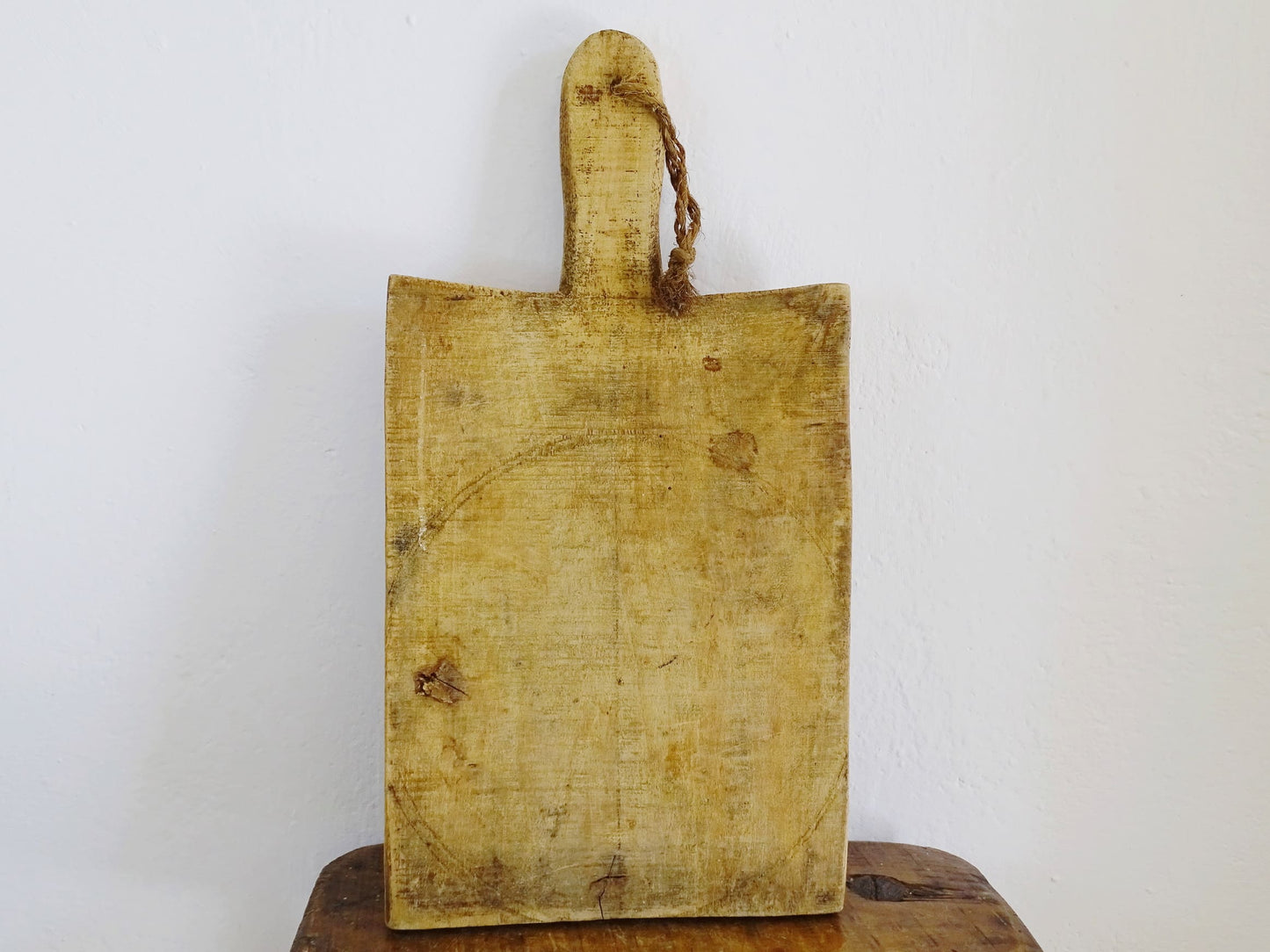 French antique wooden cutting board or chopping board with handle and rich patina