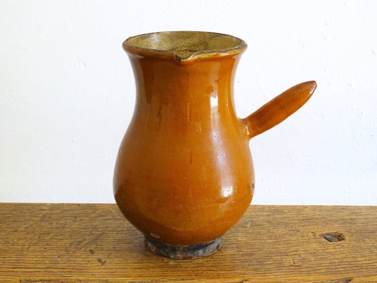 French antique glazed terracotta jug with side handle and red rust colour