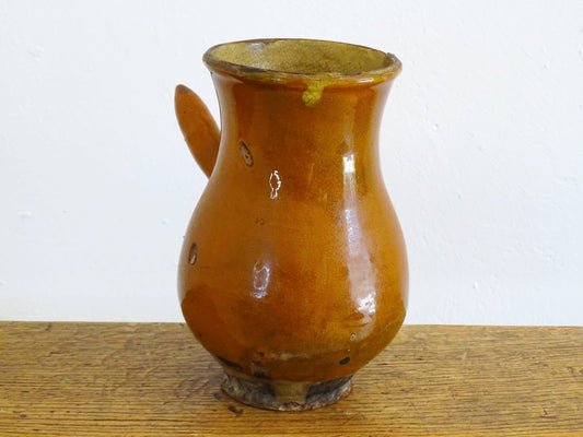 French antique glazed terracotta jug with side handle and red rust colour