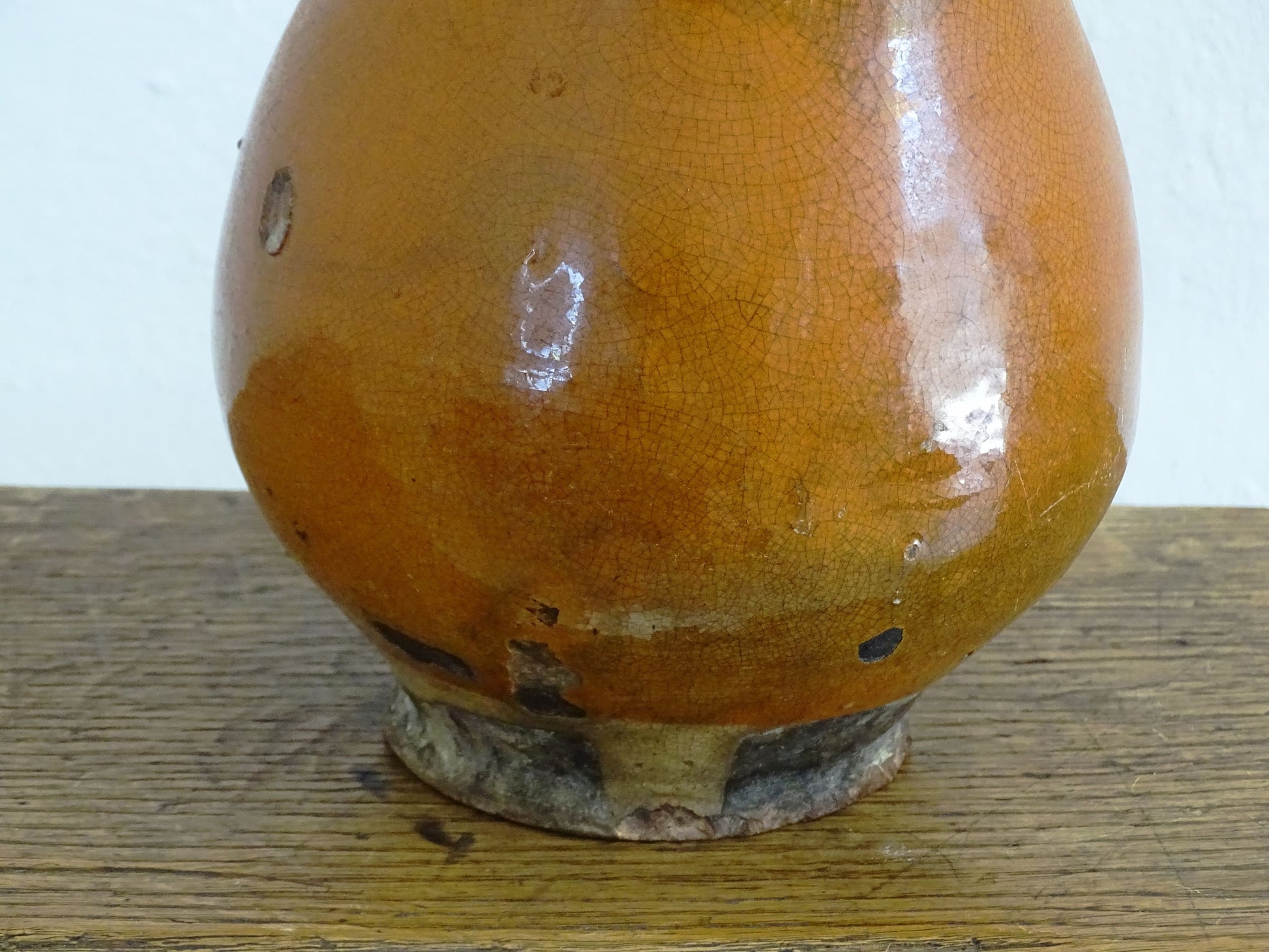 French antique glazed terracotta jug with side handle and red rust colour