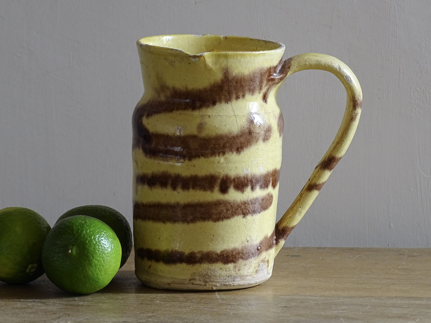 French antique ceramic jug with yellow and brown glaze. Dieulefit pottery.