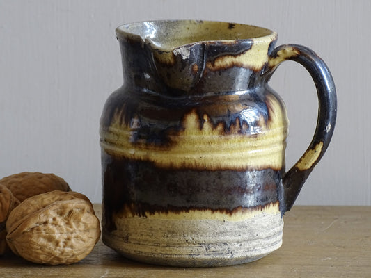 French antique ceramic pitcher with brown and yellow glaze