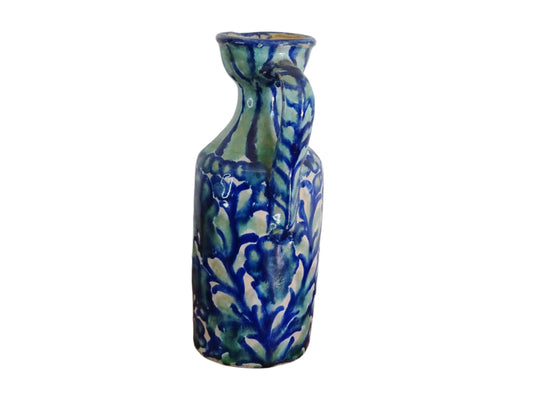 Spanish antique Fajalauza pottery jug, hand-painted in blue and green with a pink background. Decorated with stripes to the top and handle and flowers, leaves and a bird. Tin glazed terracotta pitcher. 