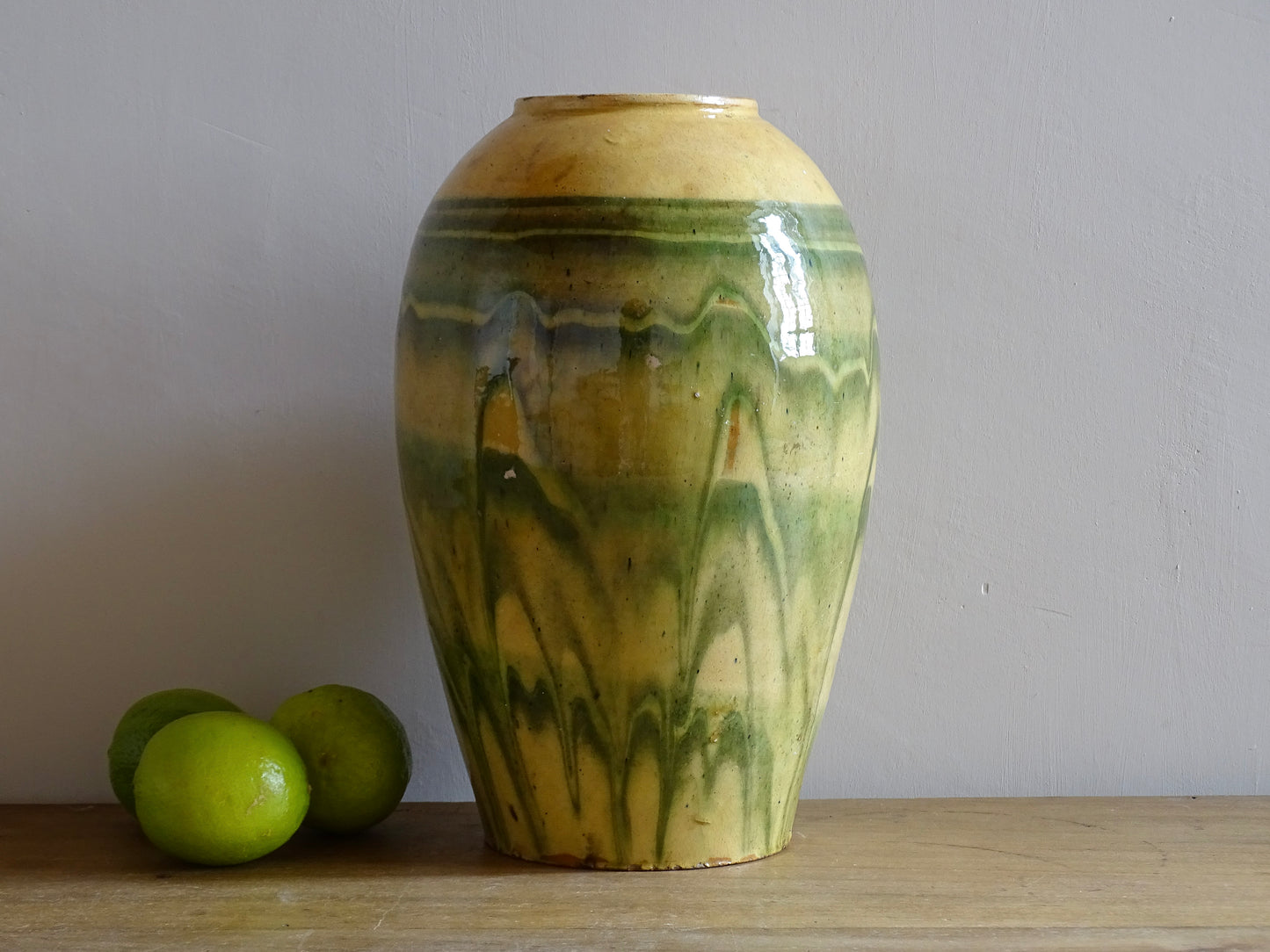 French antique terracotta vase with a green and yellow glaze. Slipware or jaspe pottery vase. Savoie pottery.