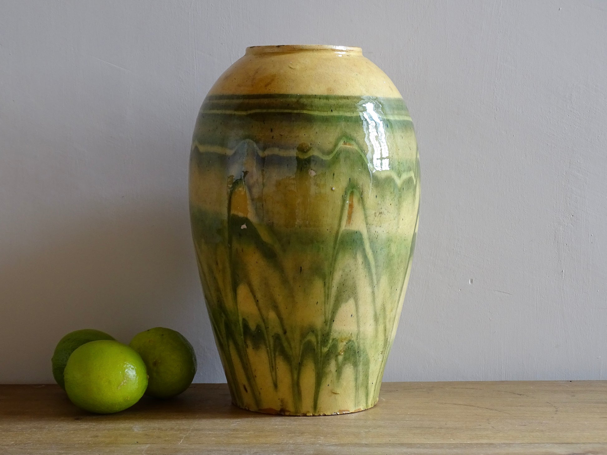 French antique terracotta vase with a green and yellow glaze. Slipware or jaspe pottery vase. Savoie pottery.