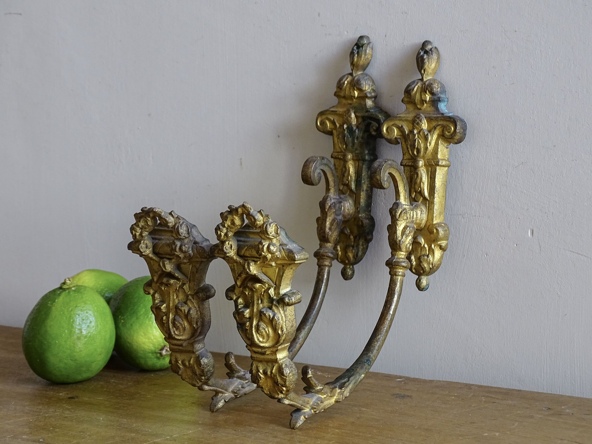 Ornate French antique gold curtain hooks