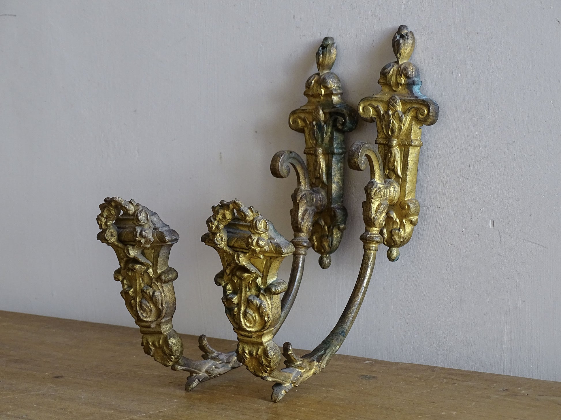 Ornate French antique gold curtain hooks