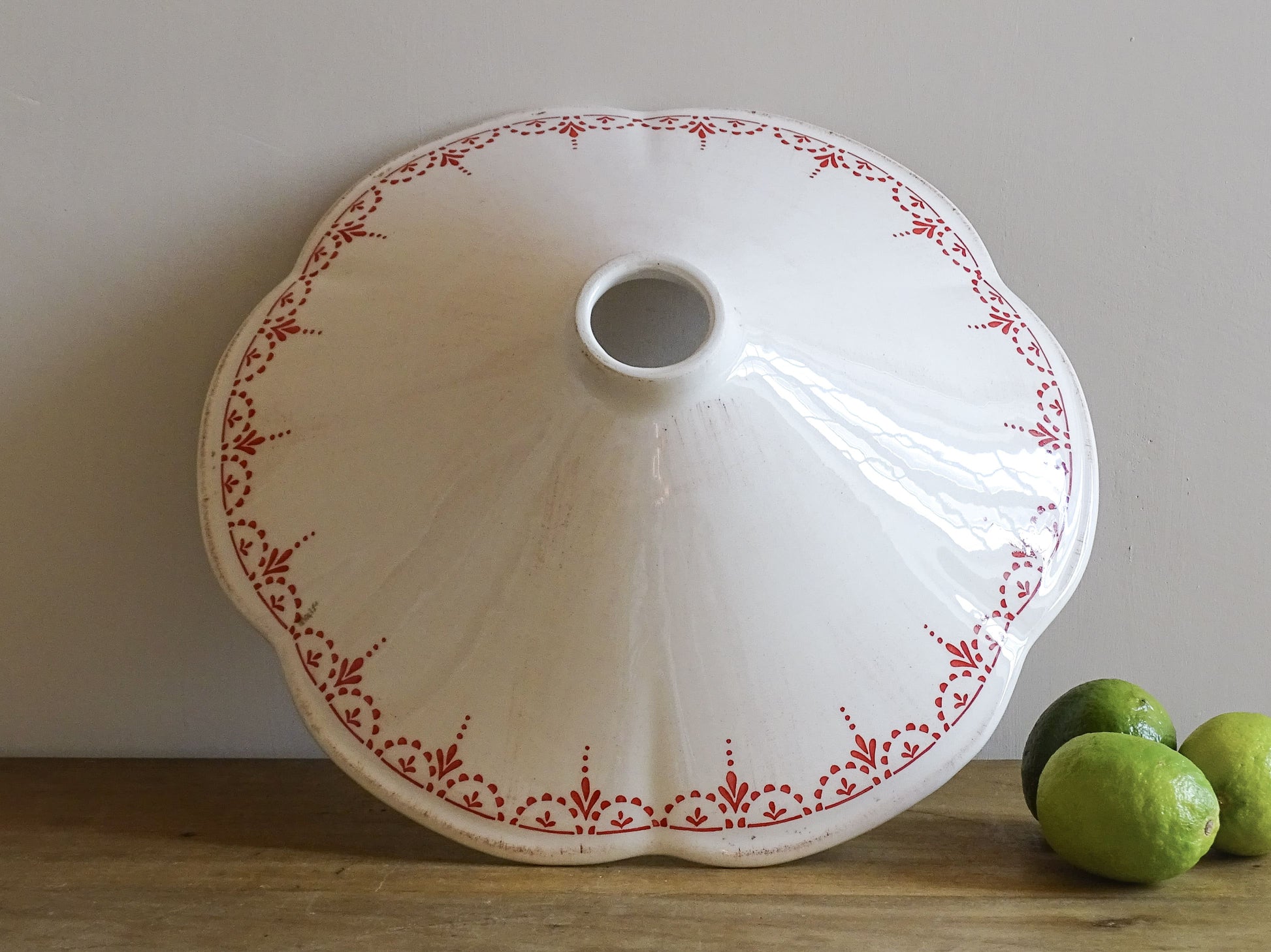 French vintage ceramic lampshade with scalloped edge with red chicken motifs and delicate red patterned detailing. 