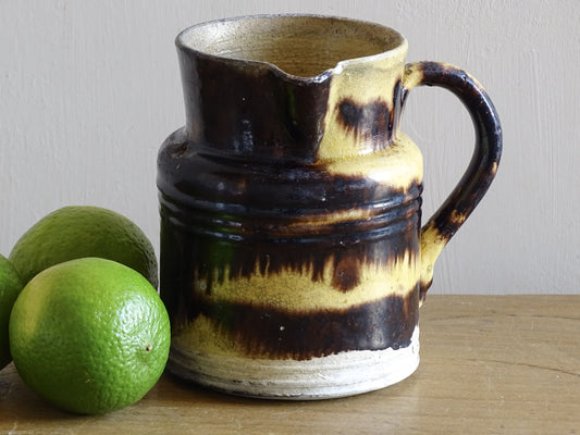 French antique pottery pitcher from Dieulefit with yellow and brown glaze