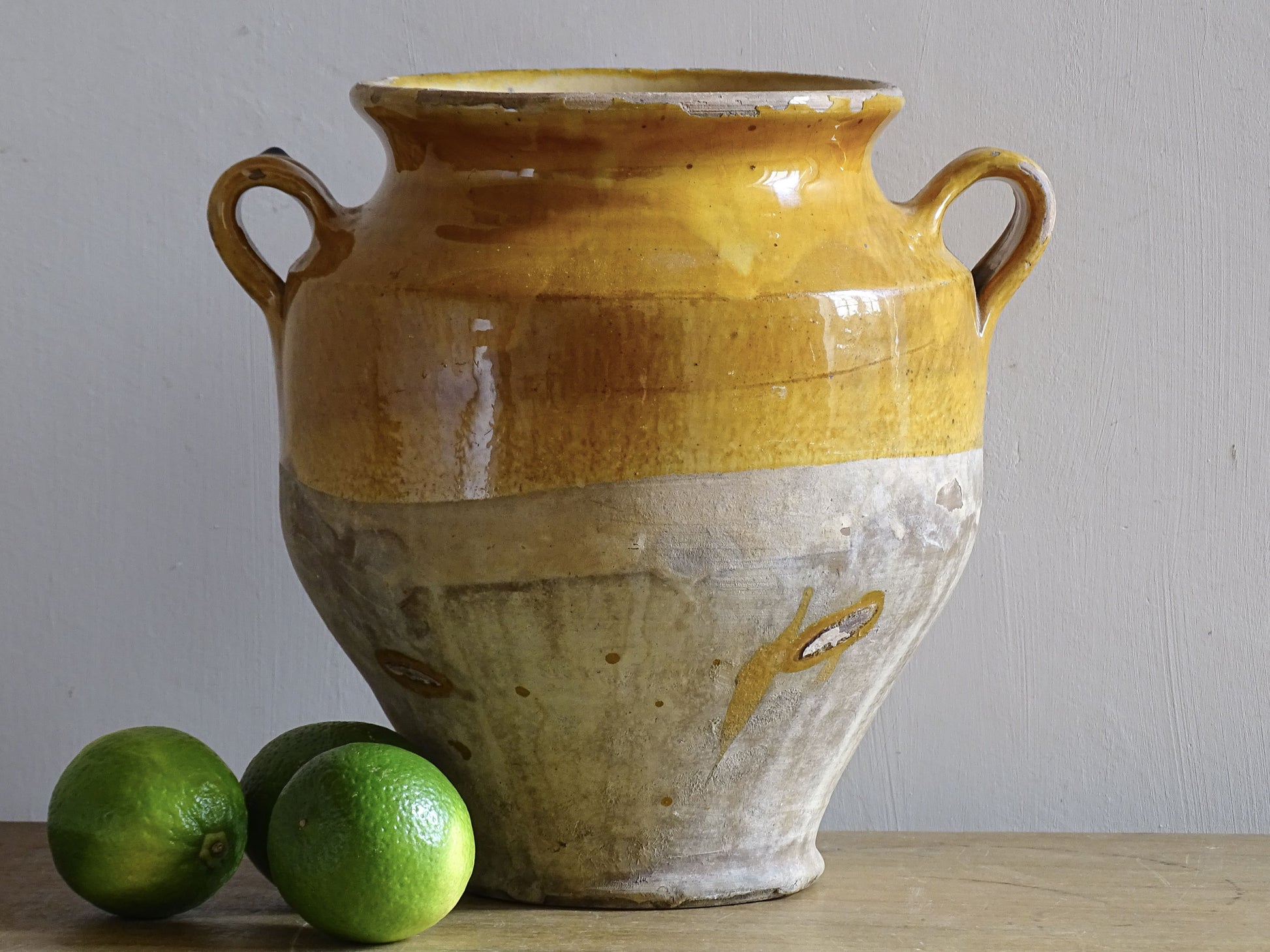 Yellow confit pot with two handles for French farmhouse decor