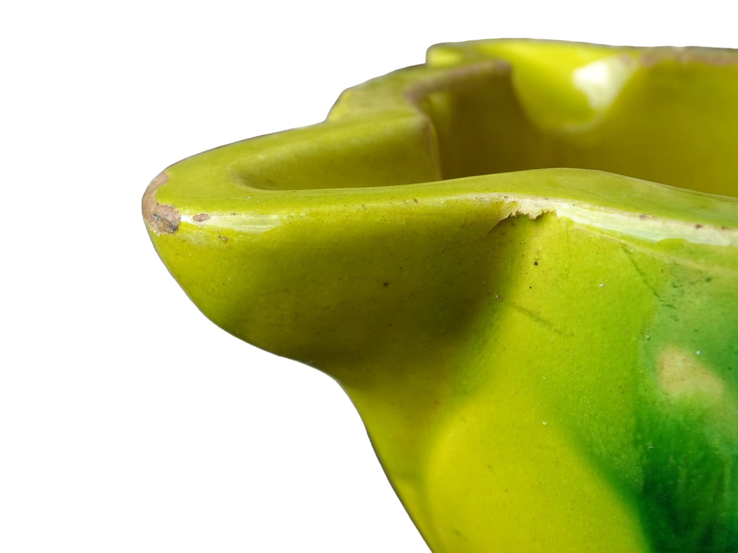 French vintage ceramic pestle and mortar with a yellow glaze and green drip glaze detailing. Wooden pestle with patina.