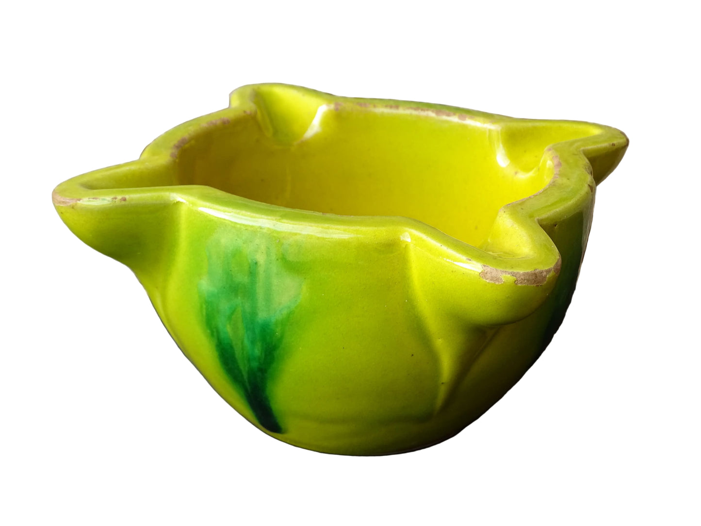 French vintage ceramic pestle and mortar with a yellow glaze and green drip glaze detailing. Wooden pestle with patina.