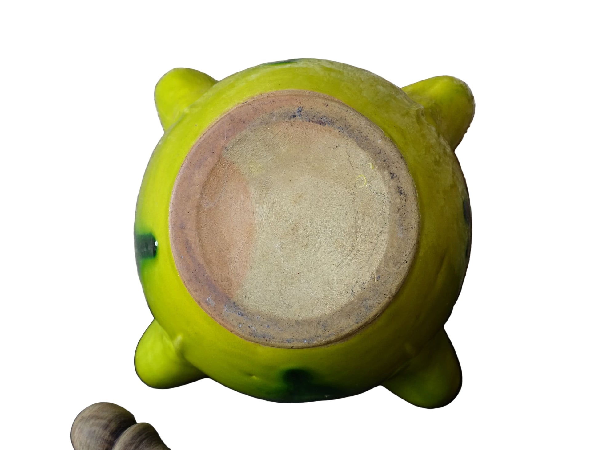 French vintage ceramic pestle and mortar with a yellow glaze and green drip glaze detailing. Wooden pestle with patina.