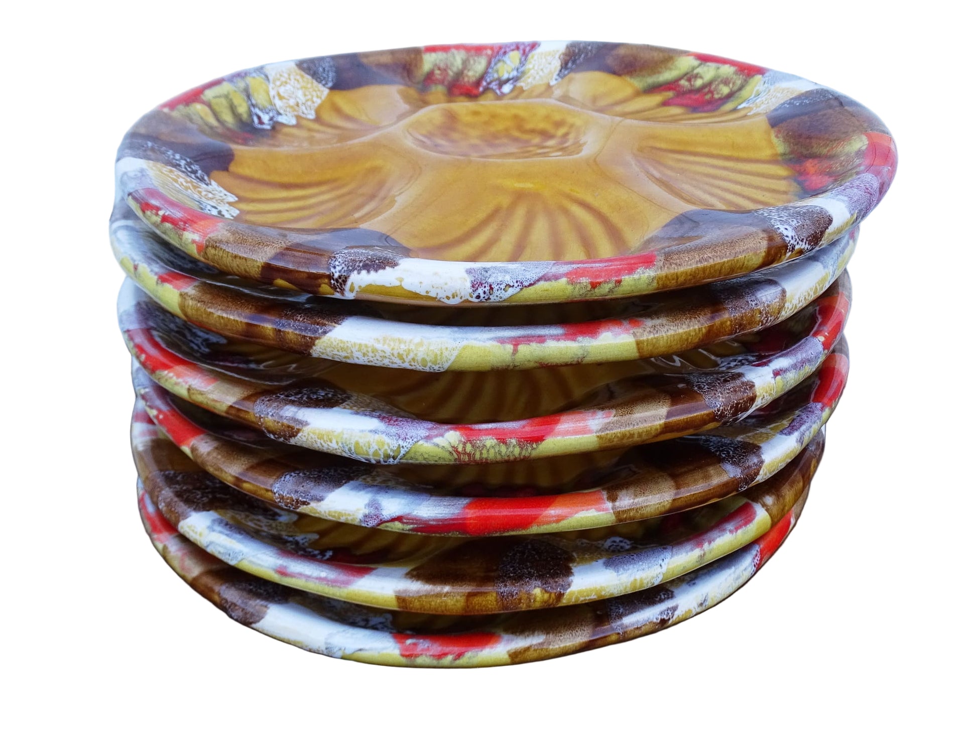 Stack of French vintage ceramic oyster plates with ochre yellow glaze. Vallauris pottery serving plates.
