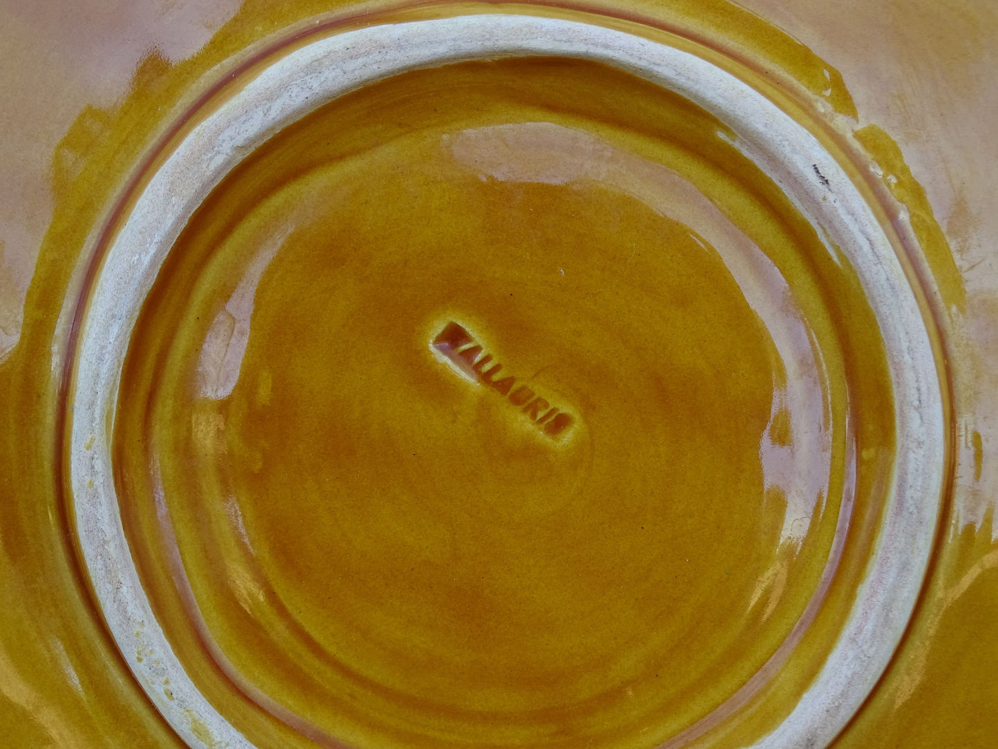 French vintage Vallauris plate with yellow glaze. 