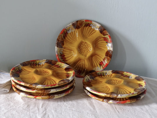 Set of six French vintage ceramic oyster plates with yellow and red glaze from Vallauris