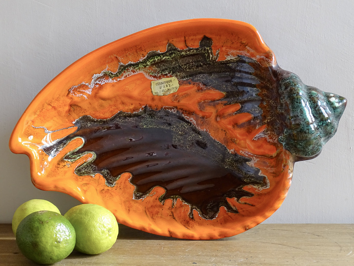 French vintage Vallauris ceramic conch bowl. Orange glazed pottery shell dish. 