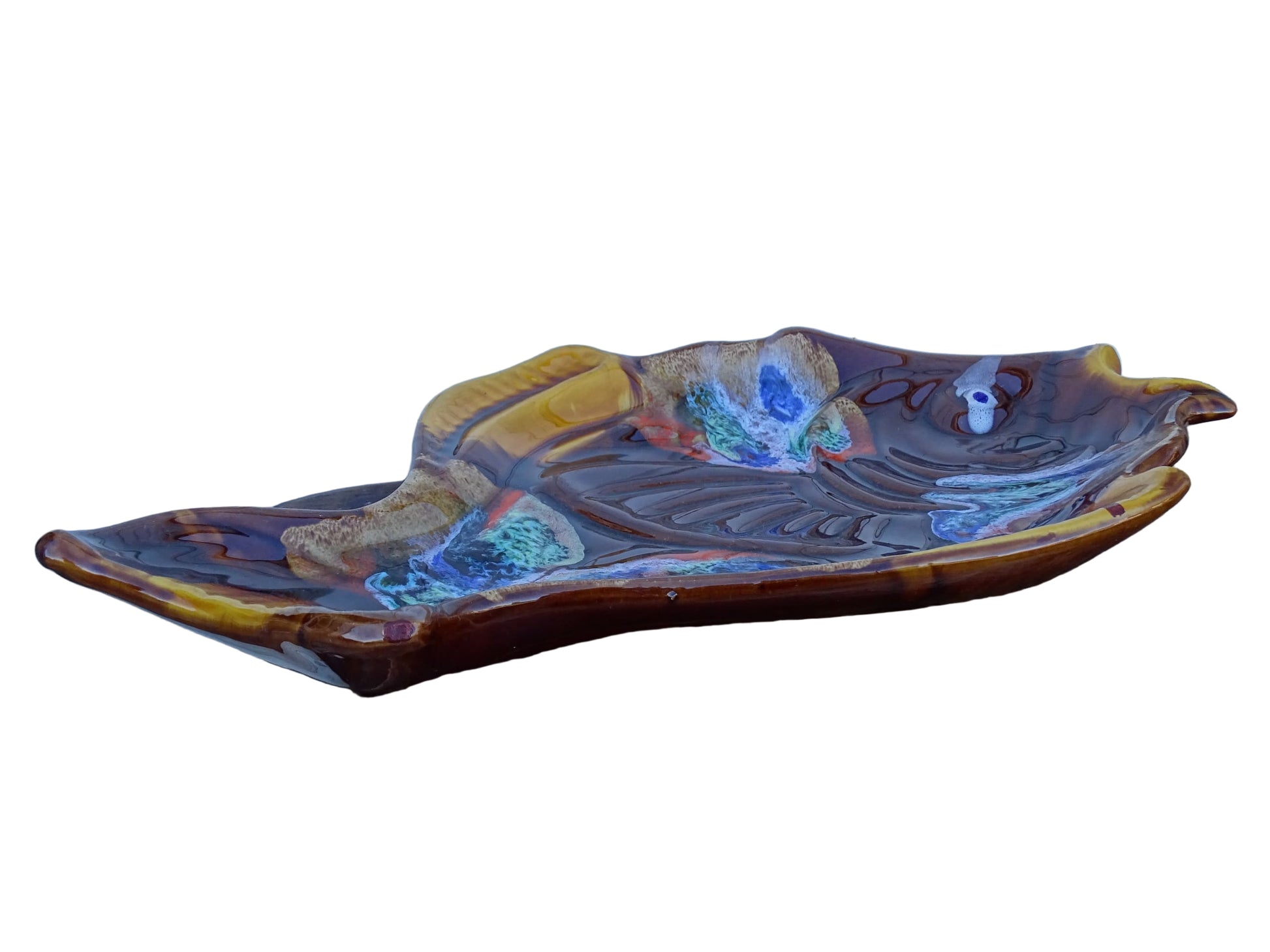 French vintage Vallauris pottery fish plate. It is glazed in brown with details in blue and red