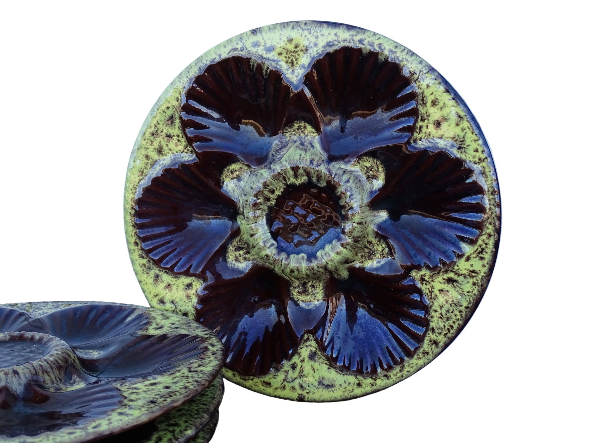 Set of four French vintage Vallauris ceramic oyster plates by Maruis Giuge with space for six oysters. They have a yellow and brown glaze.