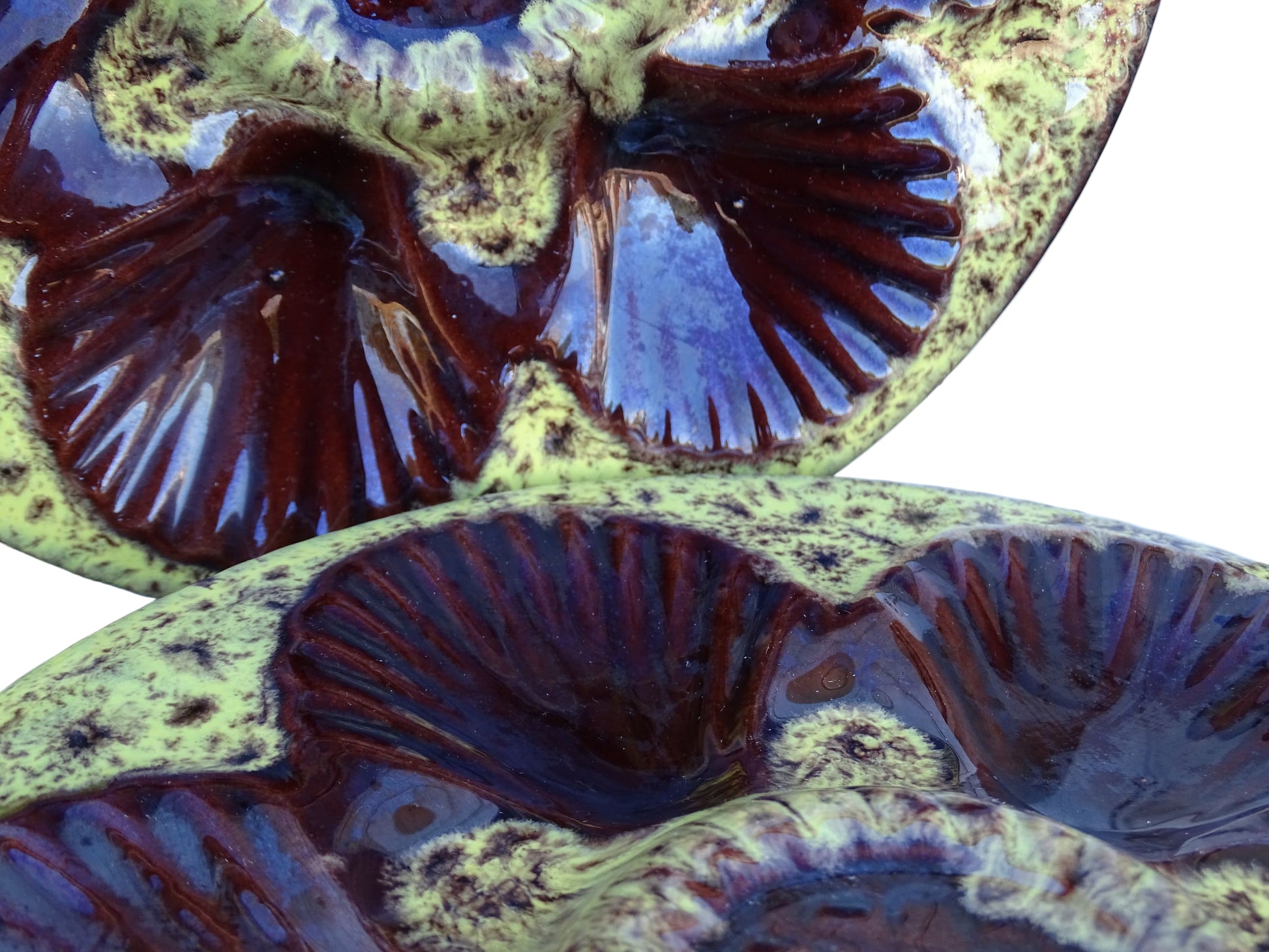 Set of four French vintage Vallauris ceramic oyster plates by Maruis Giuge with space for six oysters. They have a yellow and brown glaze.