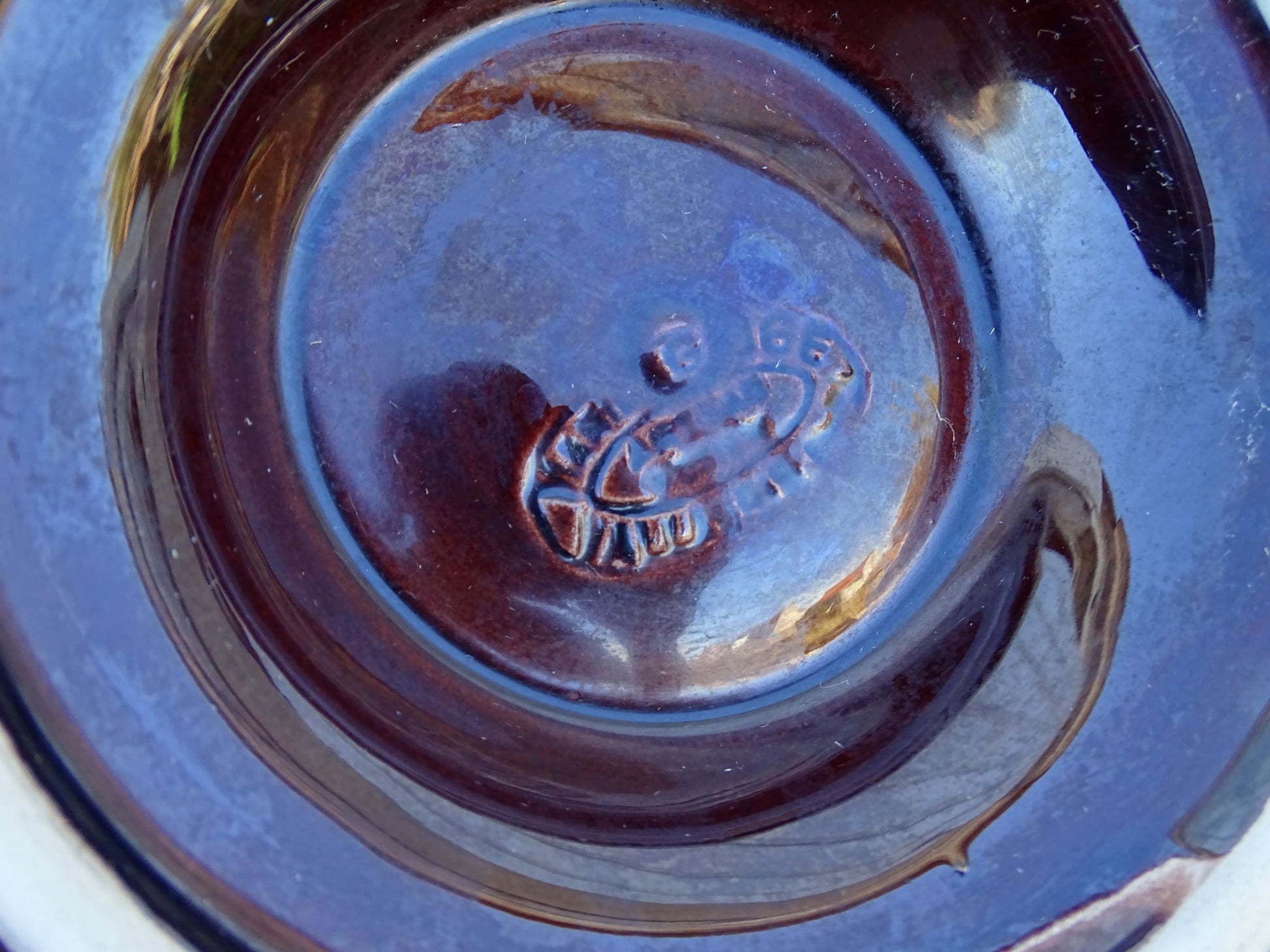 Set of four French vintage Vallauris ceramic oyster plates by Maruis Giuge with space for six oysters. They have a yellow and brown glaze.