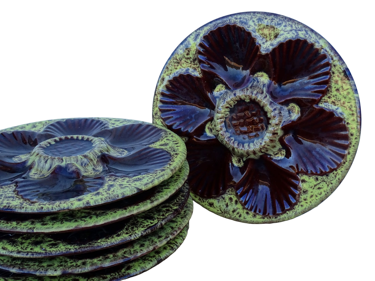 Set of six French vintage Vallauris pottery oyster plates by Maruis Giuge with space for six oysters. They have a yellow and brown glaze.
