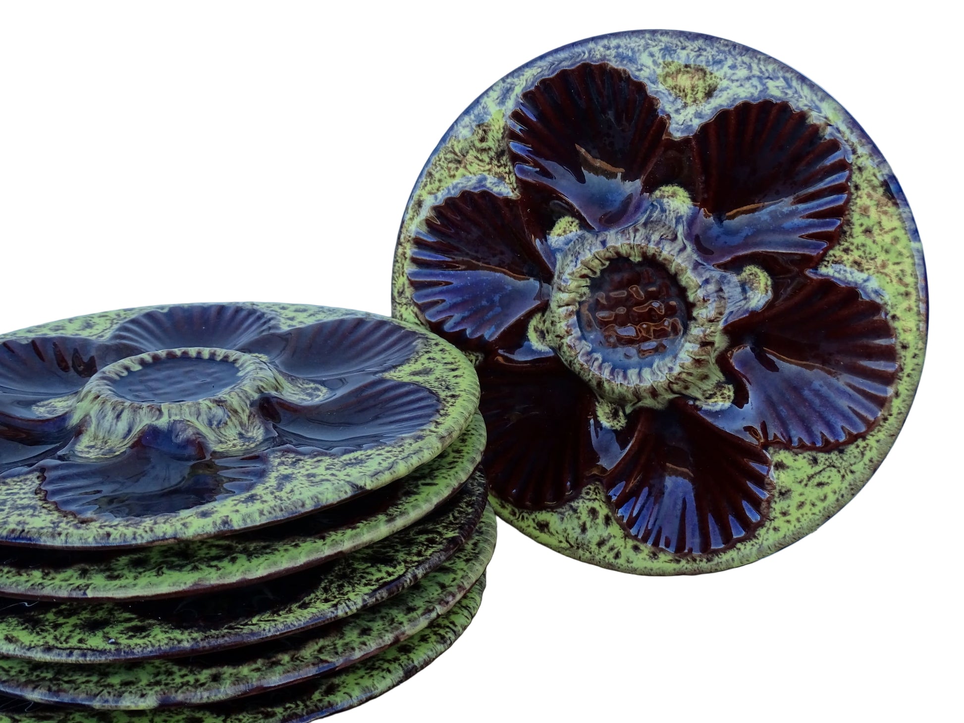 Set of six French vintage Vallauris pottery oyster plates by Maruis Giuge with space for six oysters. They have a yellow and brown glaze.