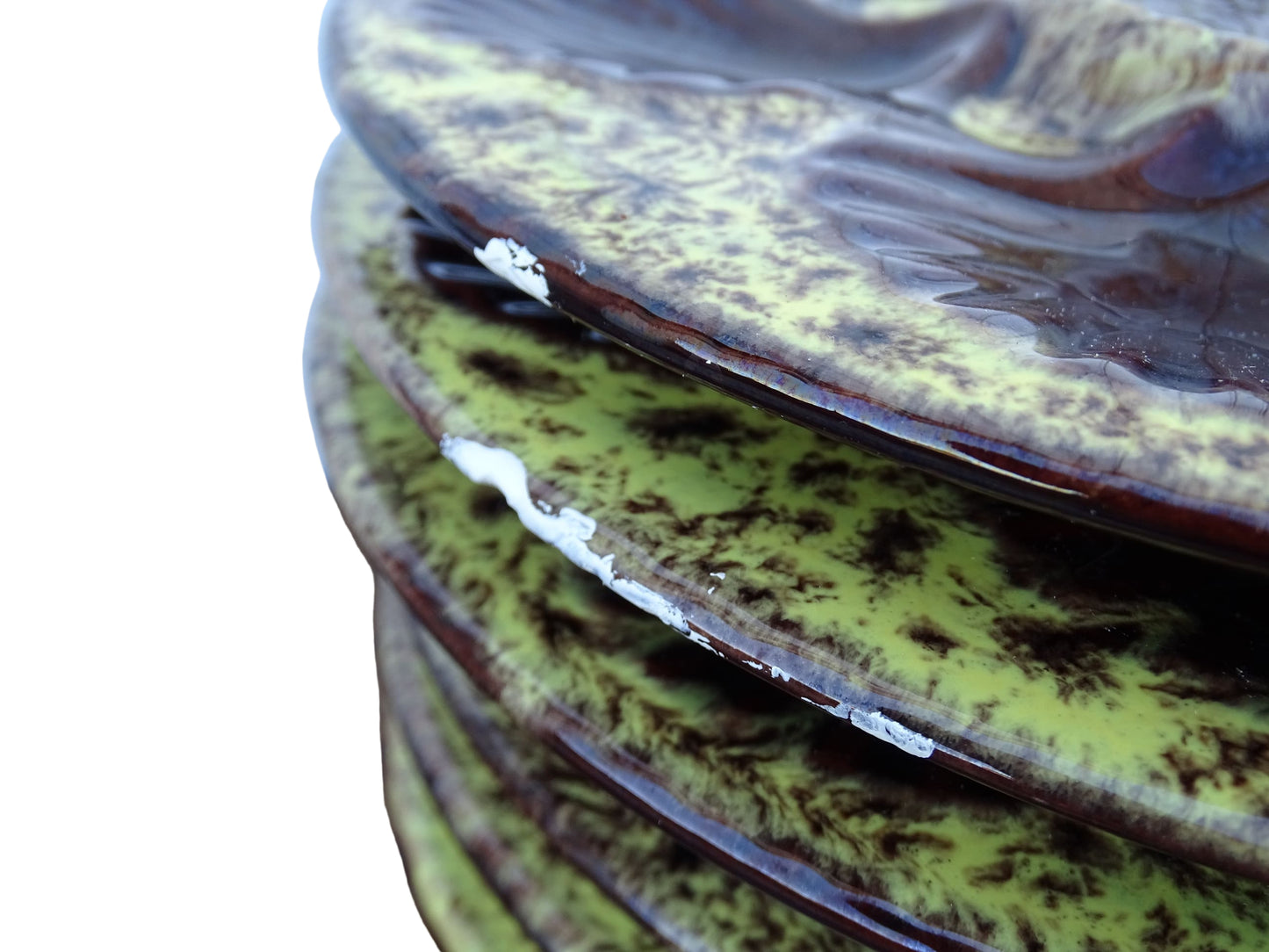 Set of six French vintage Vallauris pottery oyster plates by Maruis Giuge with space for six oysters. They have a yellow and brown glaze.