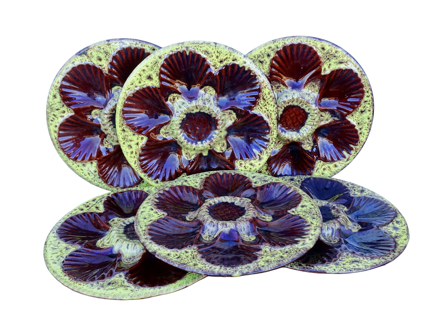 Set of six French vintage Vallauris pottery oyster plates by Maruis Giuge with space for six oysters. They have a yellow and brown glaze.