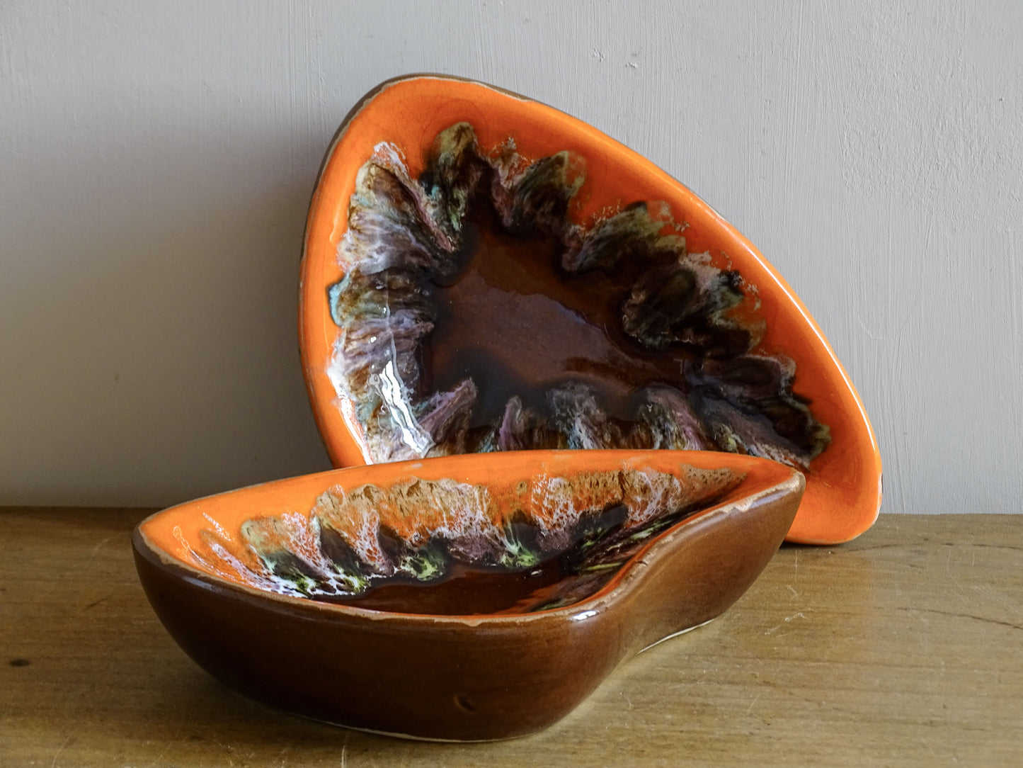 French vintage Vallauris pottery dishes with orange and brown glaze
