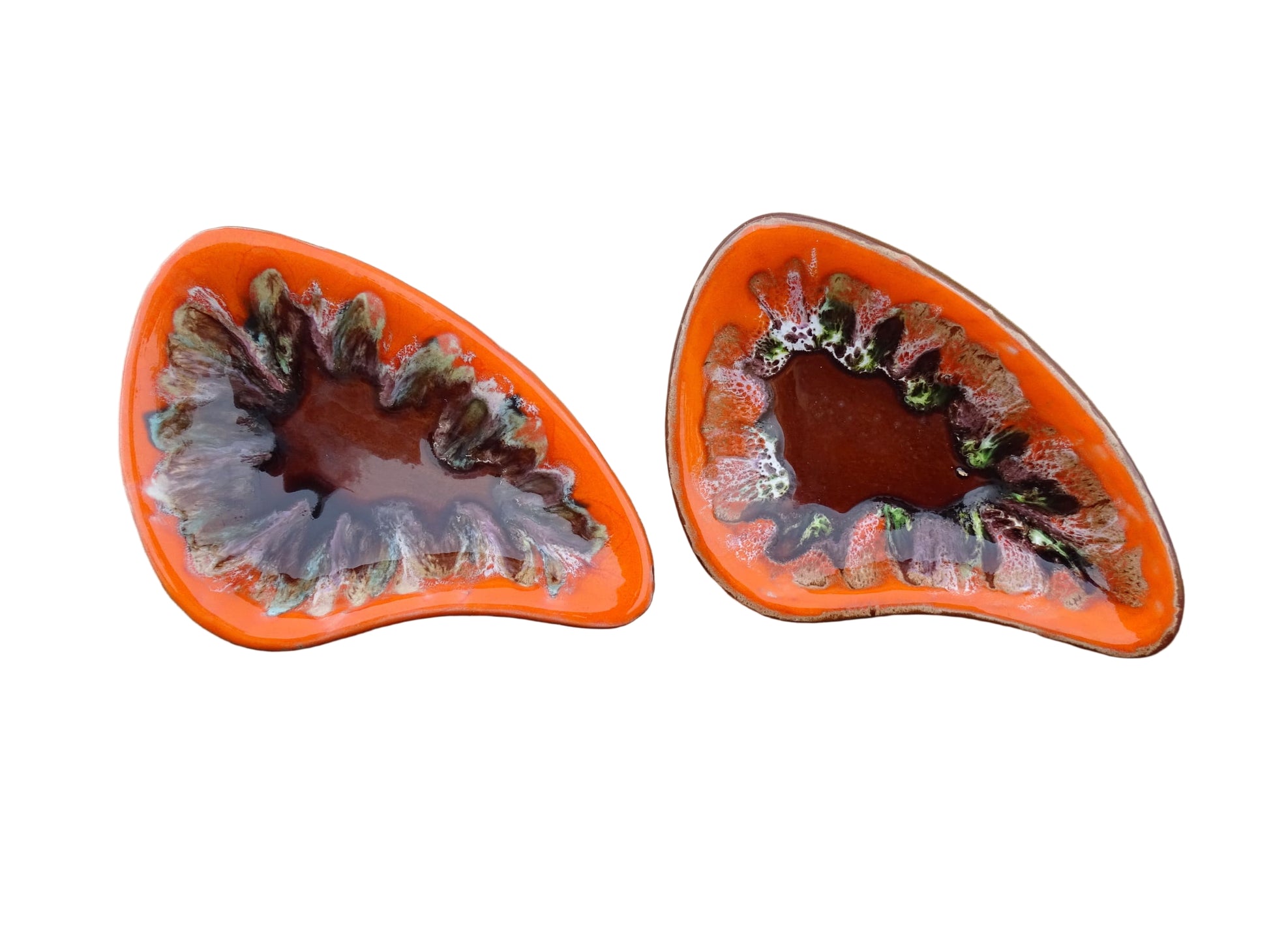 Pair of French vintage Vallauris ceramic dishes. Kidney shaped bowls with orange glaze with mid-century design.