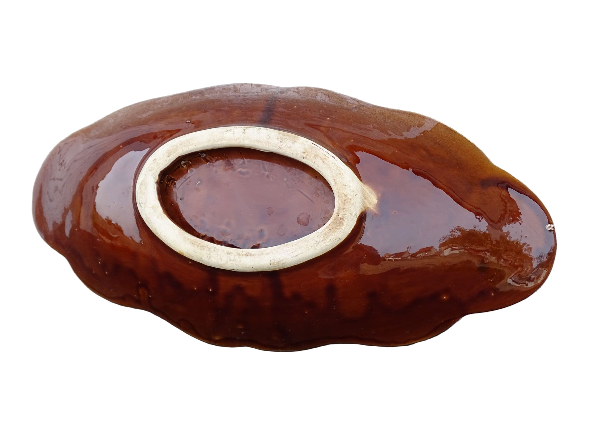 French vintage Vallauris pottery bowl with a brown glaze and red and green detailing. The ceramic centrepiece has a geometric design to the centre and a free flow design to the edge.