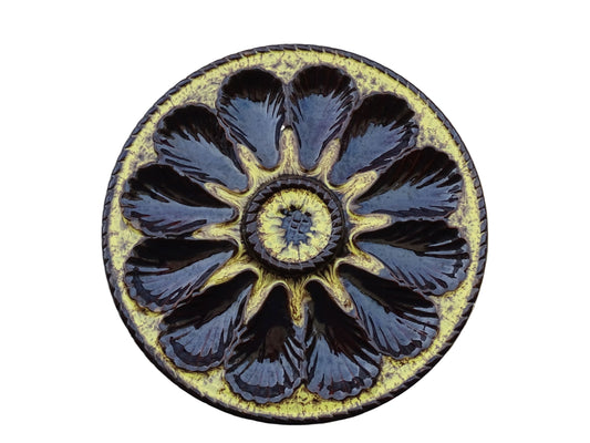Large French vintage Vallauris pottery oyster plate by Maruis Giuge with space for twelve oysters. It has a yellow and brown glaze.