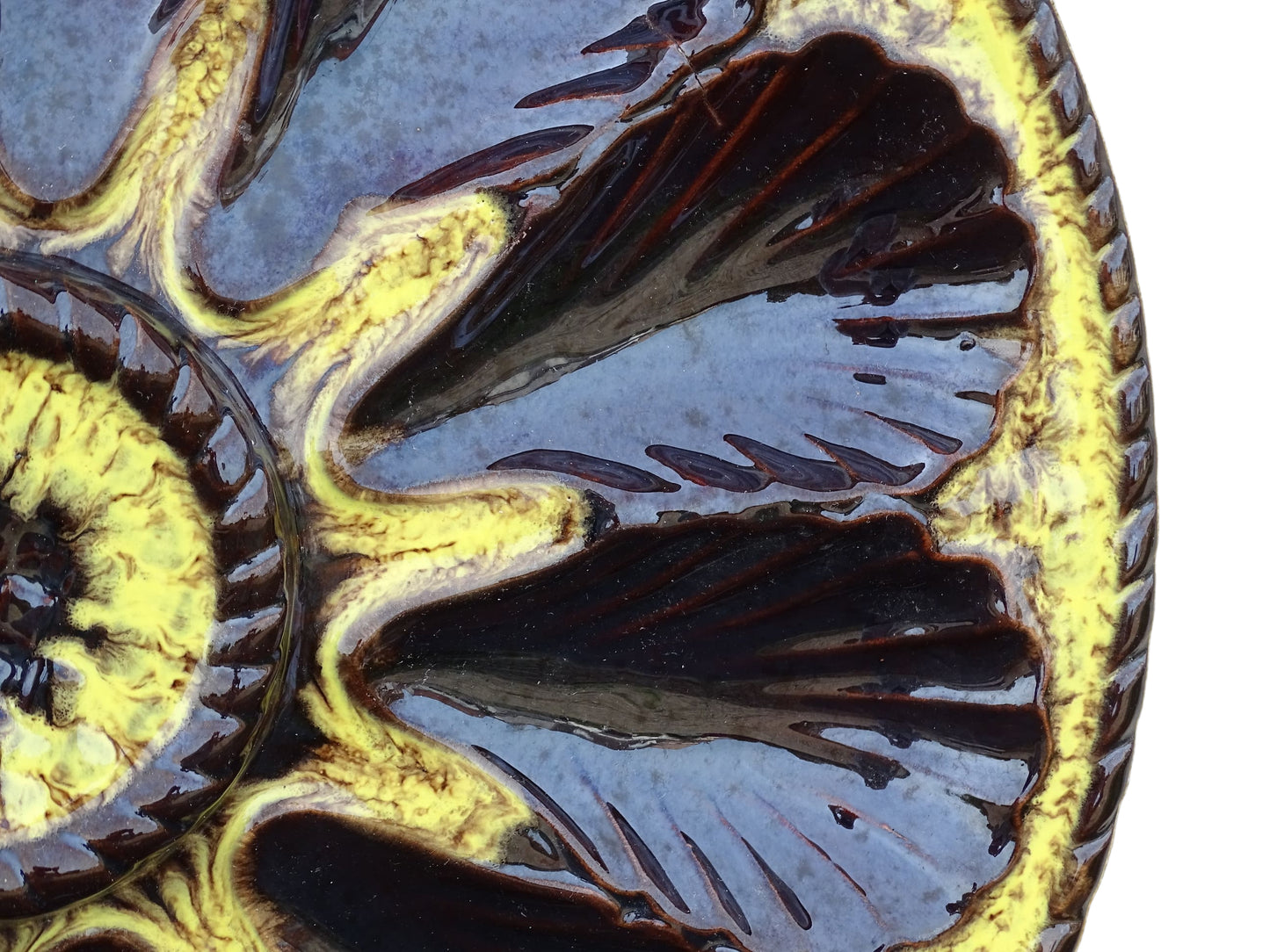 Large French vintage Vallauris pottery oyster plate by Maruis Giuge with space for twelve oysters. It has a yellow and brown glaze.