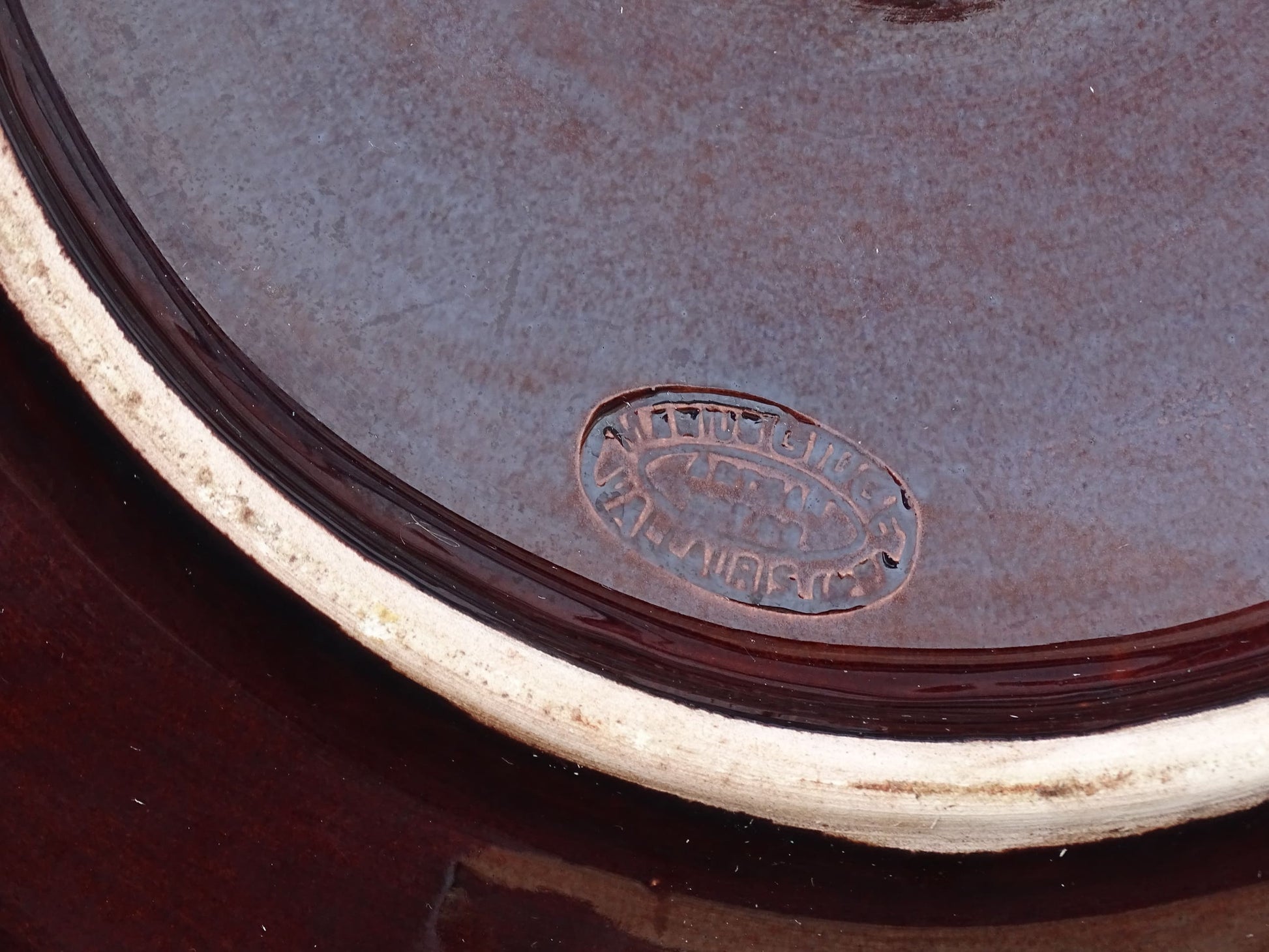 Large French vintage Vallauris pottery oyster plate by Maruis Giuge with space for twelve oysters. It has a yellow and brown glaze.
