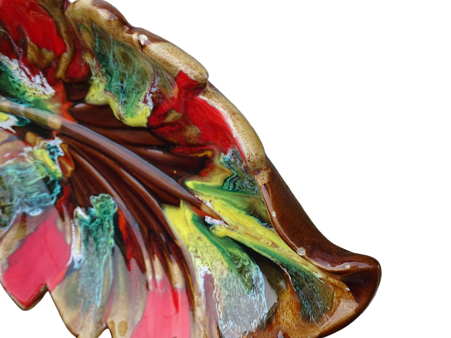 French vintage Vallauris ceramic bowl in a leaf design and glazed in brown and red with details in green, yellow and white. 