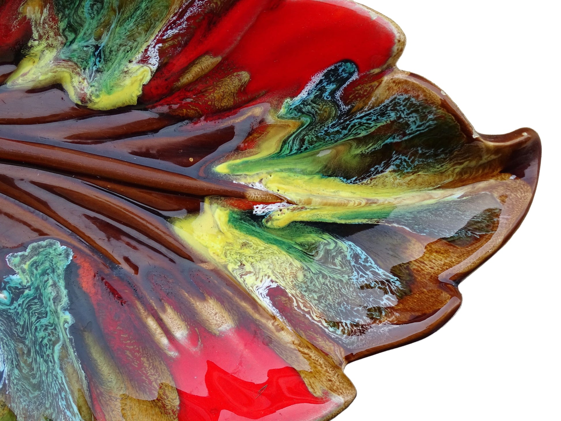 French vintage Vallauris ceramic bowl in a leaf design and glazed in brown and red with details in green, yellow and white. 