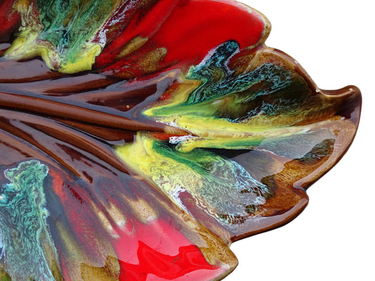 French vintage Vallauris ceramic bowl in a leaf design and glazed in brown and red with details in green, yellow and white. 