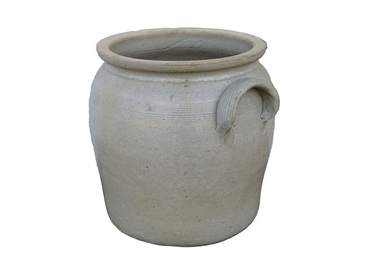 French antique stoneware confit pot with a pale beige glaze. Old cache pot or utensils holder.