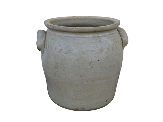 French antique stoneware confit pot with a pale beige glaze. Old cache pot or utensils holder.