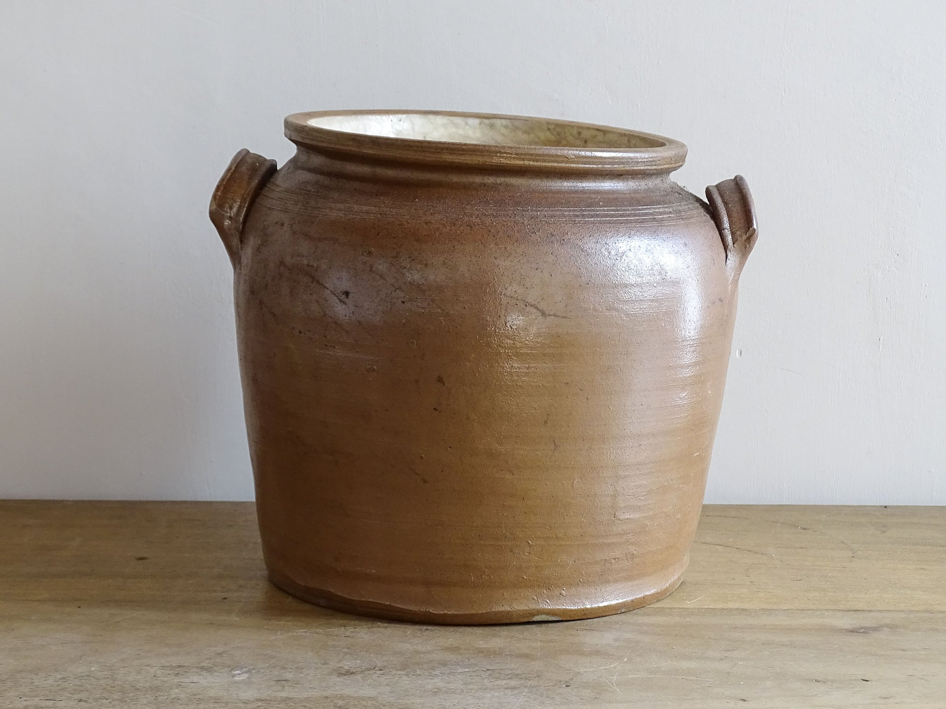 French antique stoneware confit jar with a brown salt glaze. Ceramic cache pot with two handles. 