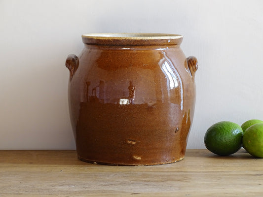 French antique stoneware preserving jar with a brown glaze. Rustic pottery cache pot with a high gloss glaze.