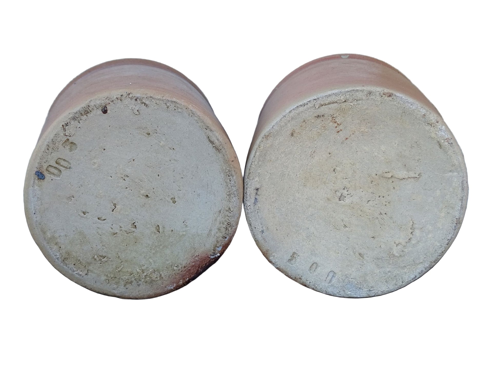 Rustic pair of French vintage stoneware pots with a brown, salt glaze. Old pottery jars with a ribbed texture.